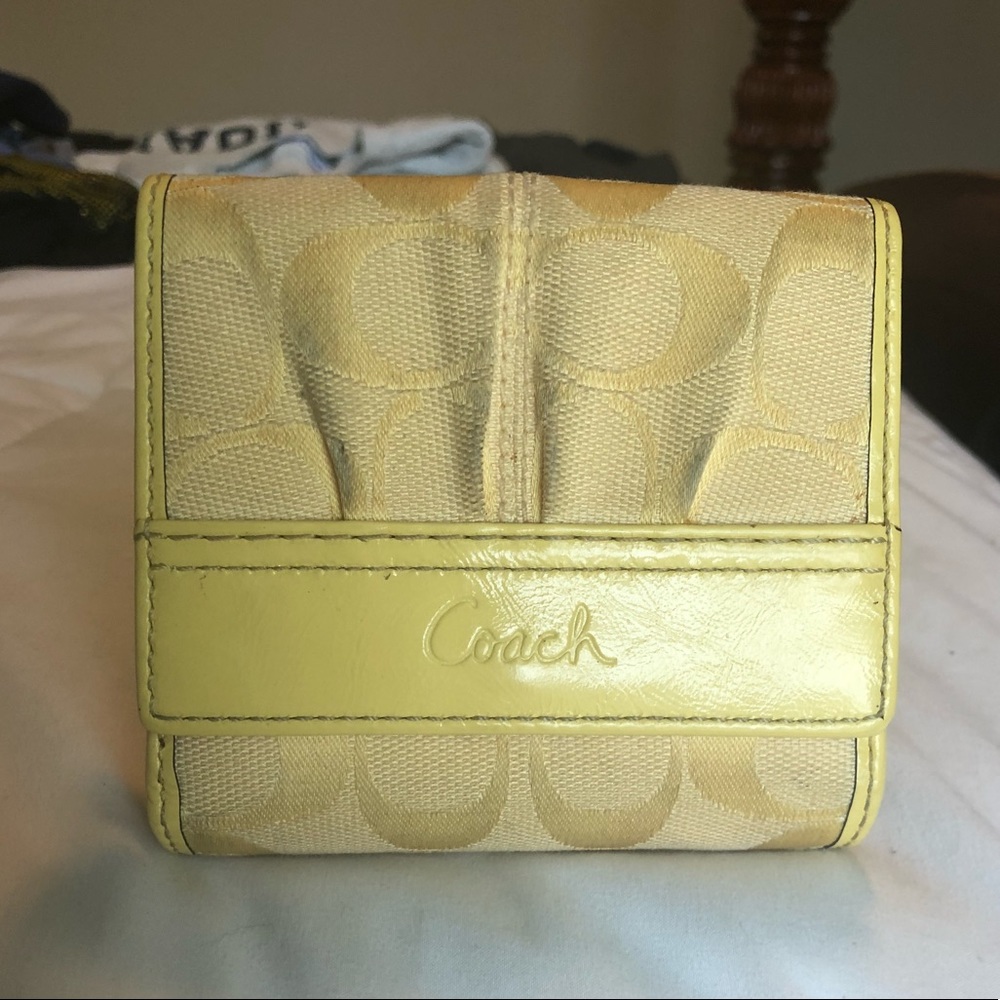 Pale yellow coach wallet